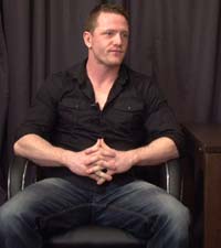 Sam is a big muscular mean-looking cage fighter. With his broad hard chest and trunk-like thighs he’s one straight guy you’d never dare stare at too long in the locker room